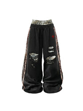CTRL WORLD Black Distressed Sweatpants with Leopard Print Detail